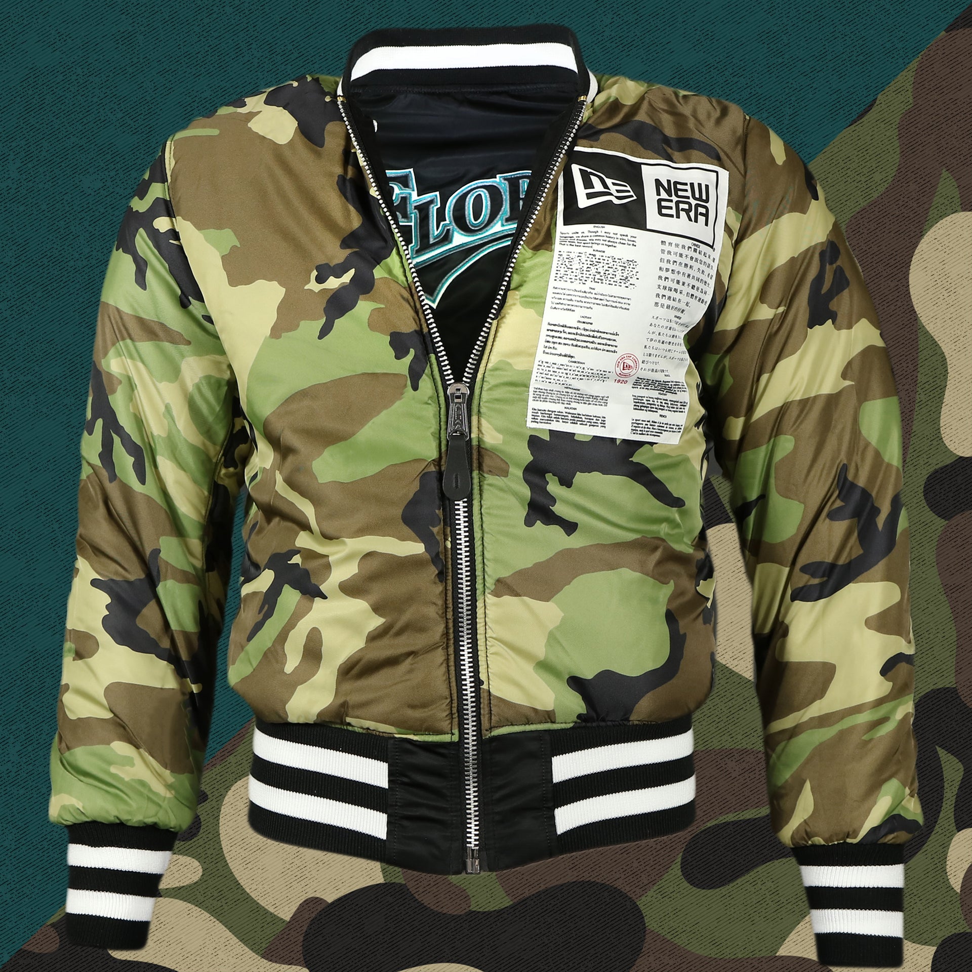 front side of the reversed side of the Florida Marlins MLB Patch Alpha Industries Reversible Bomber Jacket With Camo Liner | Black Bomber Jacket