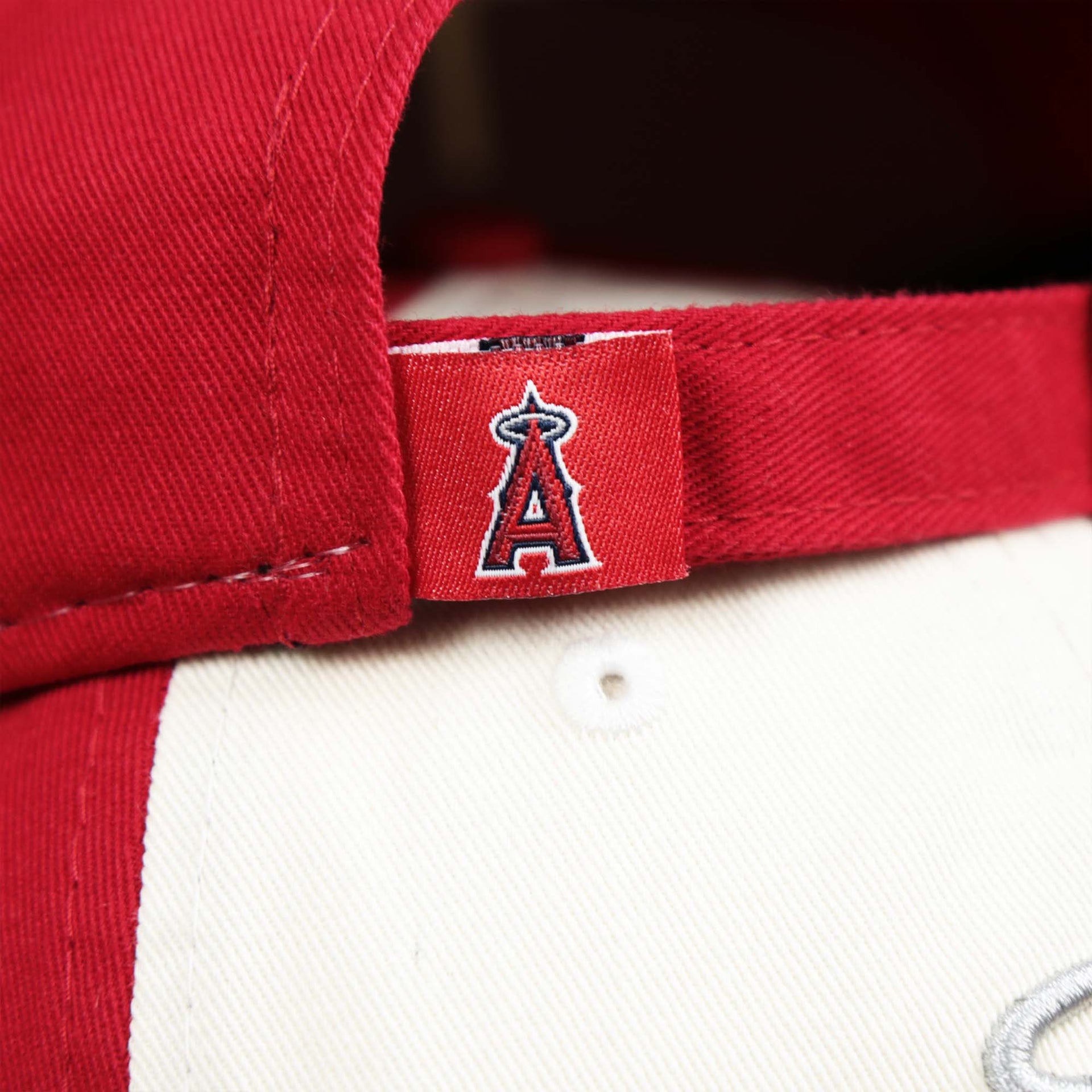 The Anaheim Angels Tag on the Anaheim Angles 2021 City Connect 9Twenty Dad Hat | New Era White and Red