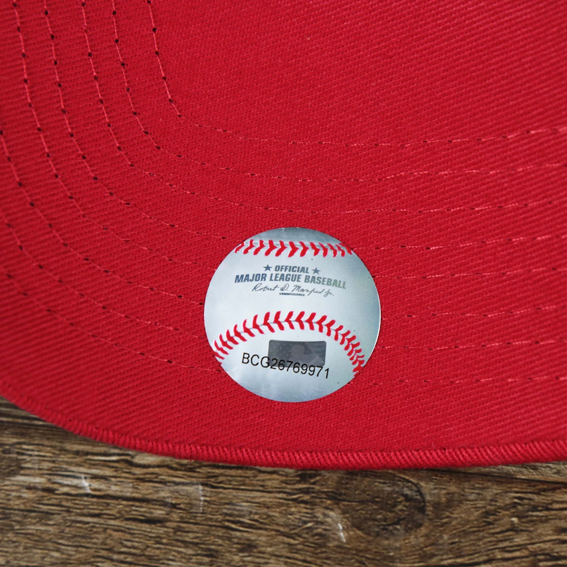 The MBL Official Sticker on the Anaheim Angles 2021 City Connect 9Twenty Dad Hat | New Era White and Red