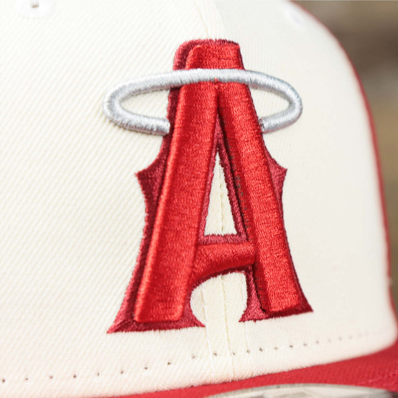 The Angels Logo on the Anaheim Angles 2021 City Connect 9Fifty Snap Cap | New Era White and Red