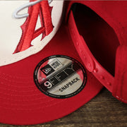 The 9Fifty Sticker on the Anaheim Angles 2021 City Connect 9Fifty Snap Cap | New Era White and Red