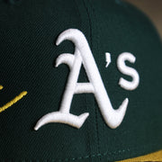 The Athletics Logo on the Oakland Athletics MLB Side Font Green Bottom 9Fifty Snapback Cap | Black Snap Cap