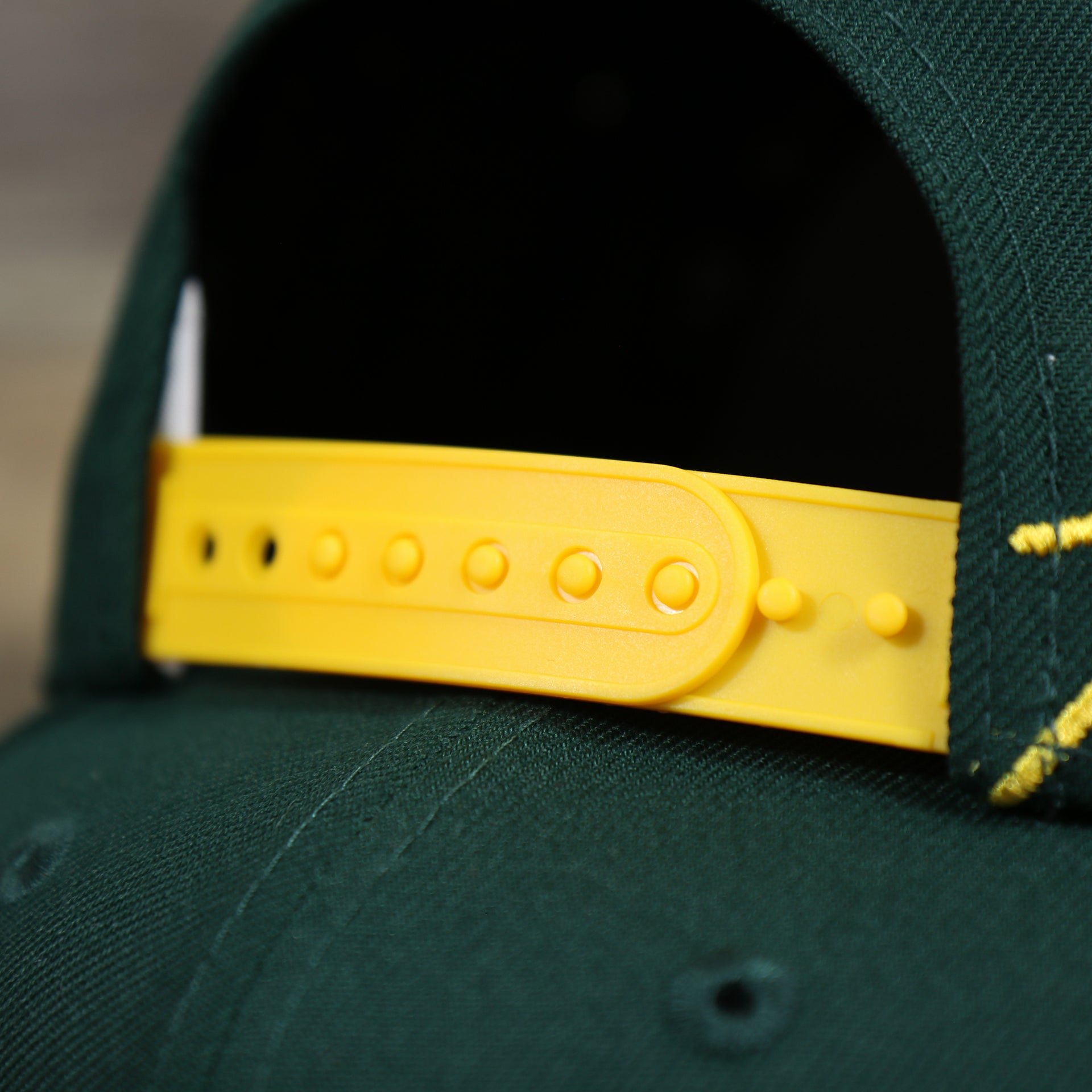The Yellow Adjustable Strap on the Oakland Athletics MLB Side Font Green Bottom 9Fifty Snapback Cap | Black Snap Cap