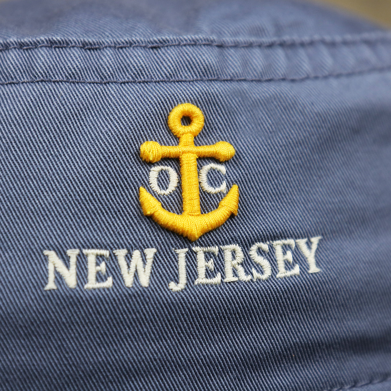 The Anchor on the Ocean City Anchor New Jersey Wordmark Bucket Hat | Slate Blue Bucket Hat