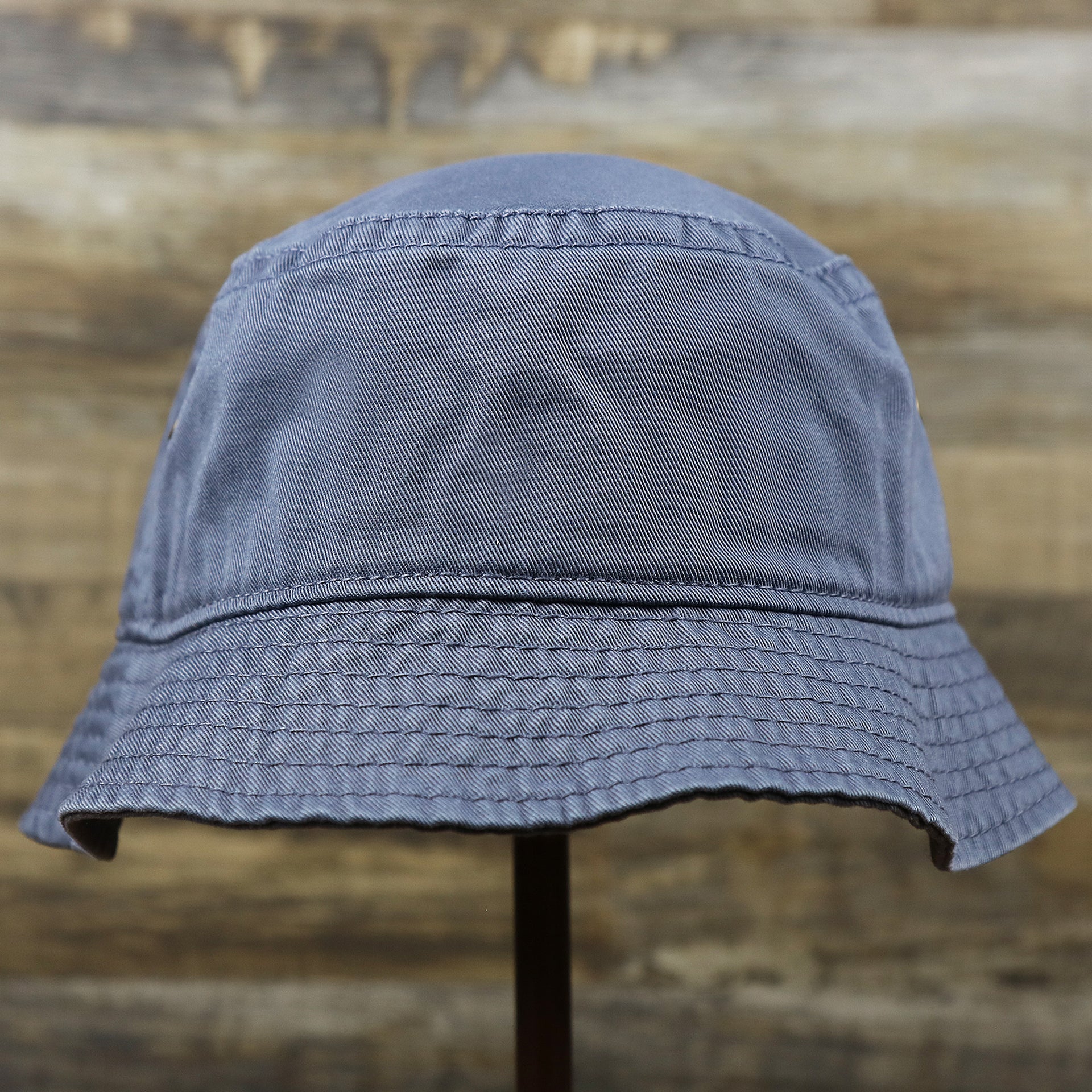 The backside of the Ocean City Anchor New Jersey Wordmark Bucket Hat | Slate Blue Bucket Hat