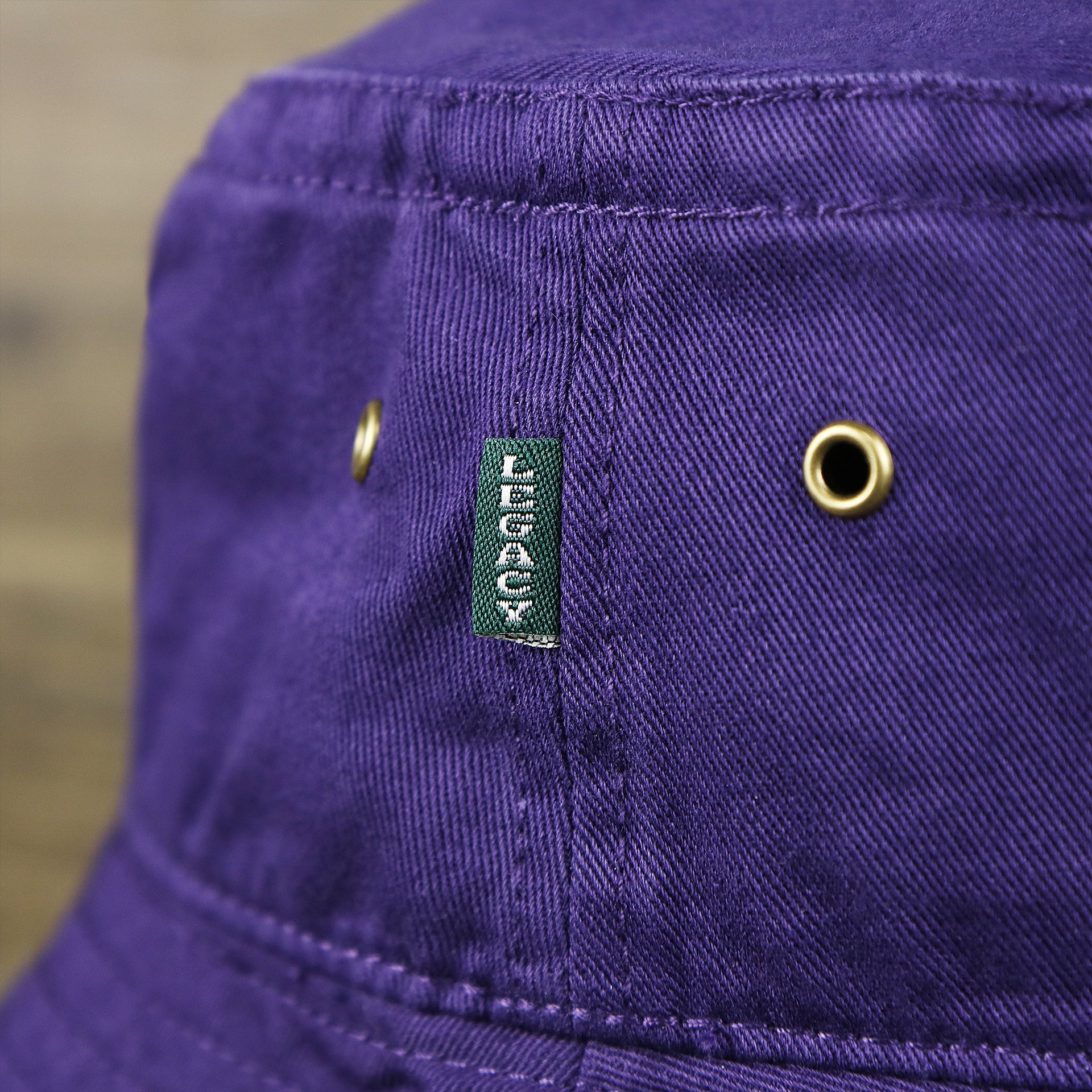 The Green Legacy Tag on the Green OCNJ Double Wordmark Pink Outline Bucket Hat | Purple Bucket Hat  