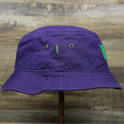 The wearer's right on the Green OCNJ Double Wordmark Pink Outline Bucket Hat | Purple Bucket Hat  