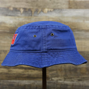 The wearer's left on the Ocean City New Jersey OCNJ Wordmark Bucket Hat | Royal Blue Bucket Hat