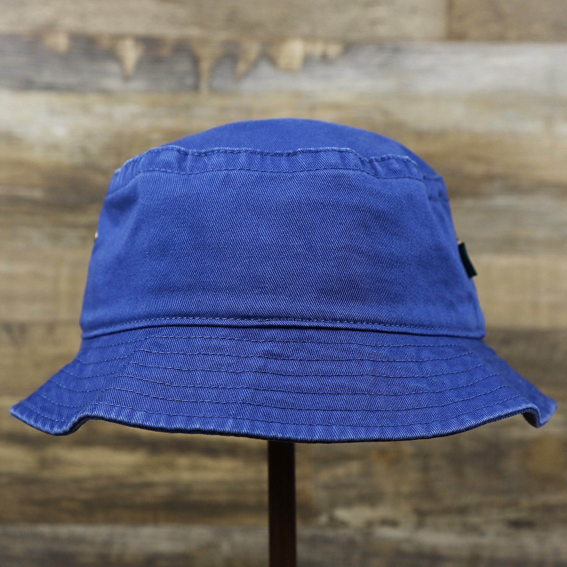 The backside of the Ocean City New Jersey OCNJ Wordmark Bucket Hat | Royal Blue Bucket Hat