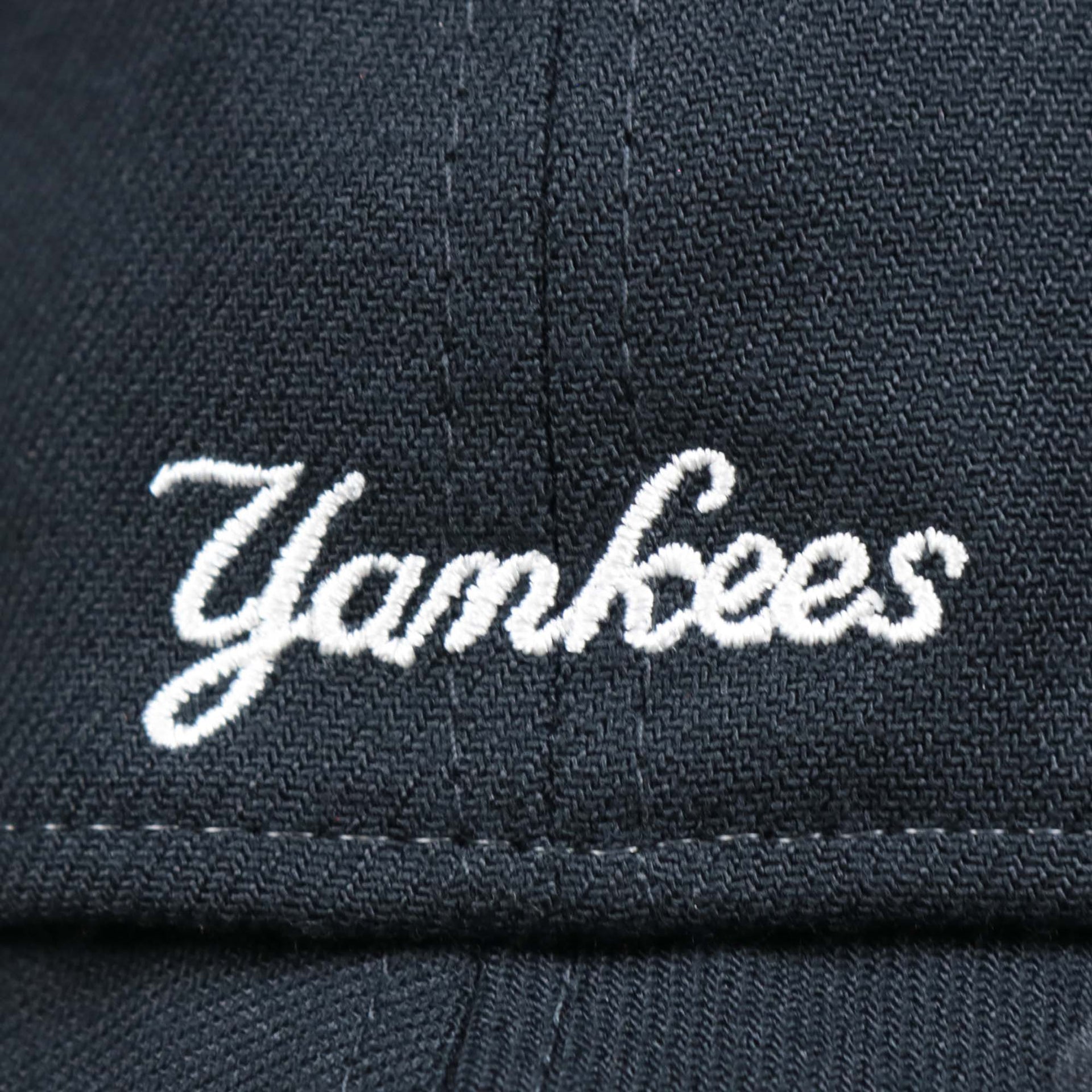 The Yankees Wordmark on the New York Yankees 2022 4th of July Stars And Stripes 39Thirty | New Era Navy OSFM