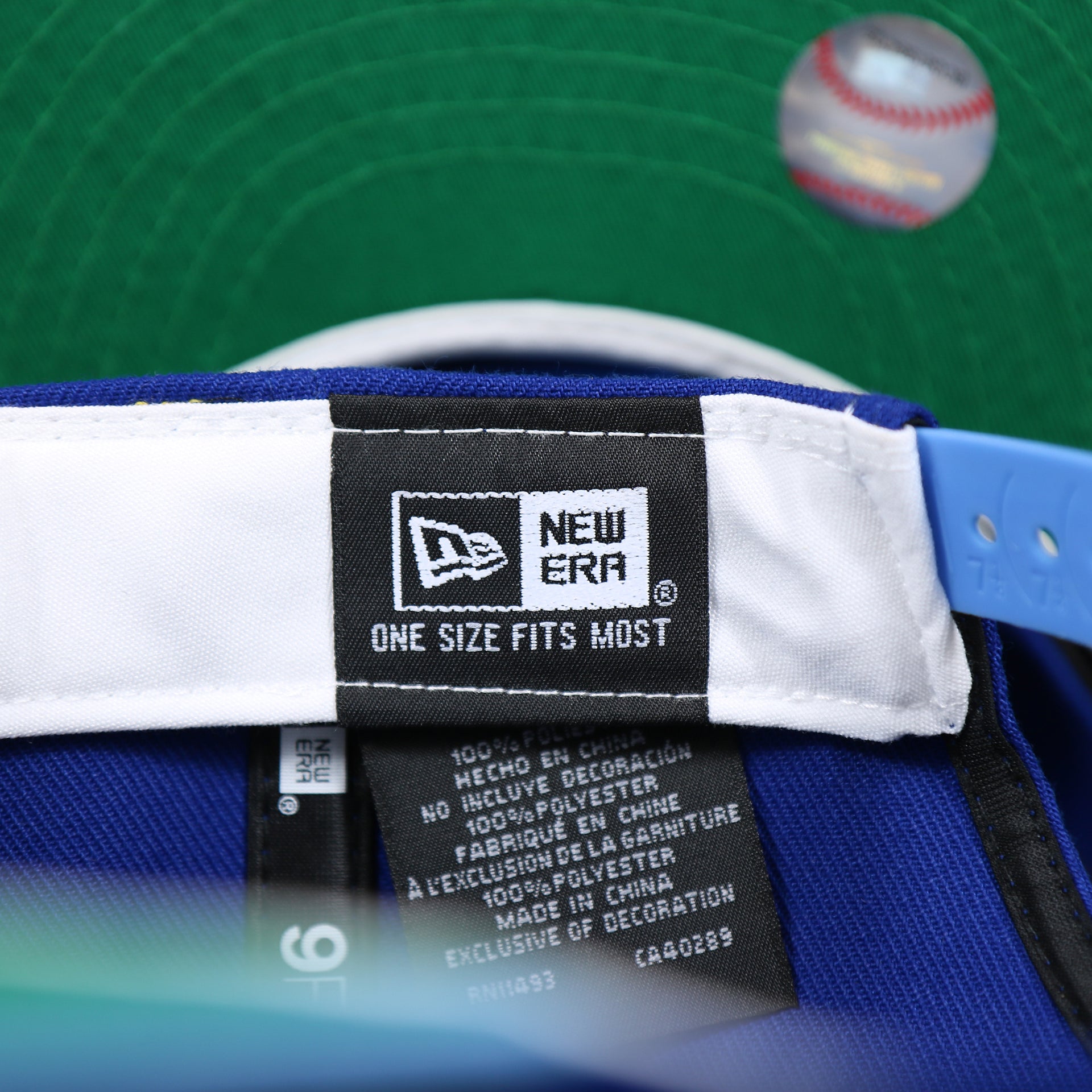 The New Era Tag on the Cooperstown Toronto Blue Jays MLB Side Font Green Bottom 9Fifty Snapback Cap | Royal Blue Snap Cap