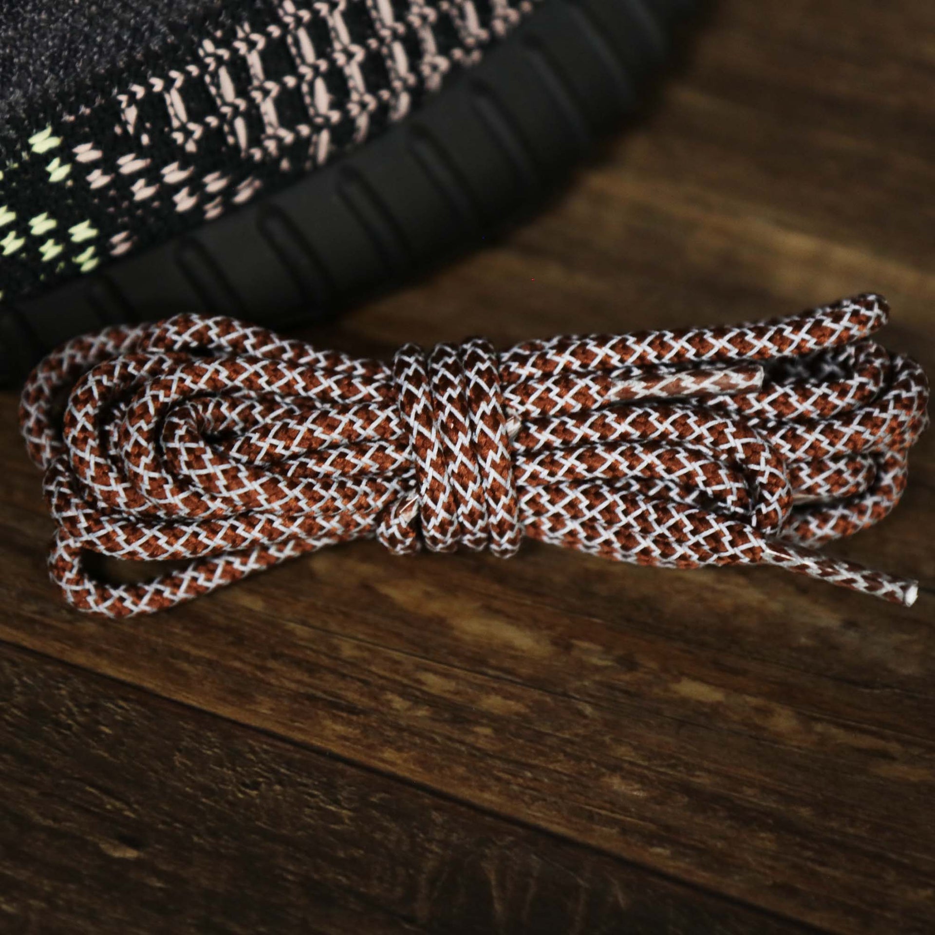 The 3M Reflective Brown Solid Shoelaces with Brown Aglets | 120cm Capswag folded up and refelctive