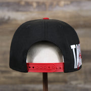 The backside of the Tampa Bay Buccaneers NFL Side Font Green Bottom 9Fifty Snapback Cap | Black Snap Cap