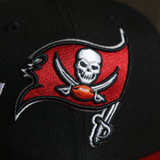 The Buccaneers Logo on the Tampa Bay Buccaneers NFL Side Font Green Bottom 9Fifty Snapback Cap | Black Snap Cap