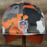 The backside of the Throwback Tampa Bay Buccaneers OnField NFL Summer Training 2022 39Thirty Camo FlexFit Cap | New Era Orange