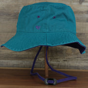 The wearer's left on the Mighty Ducks Vintage 90s Anaheim Ducks Grape 5s Matching Bucket Hat | 47 Brand, Dark Teal