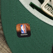 The NBA Offical Headwear Sticker on the Youth Milwaukee Bucks NBA 2022 Draft Gray Bottom 9Fifty Snapback | New Era Cream/Green