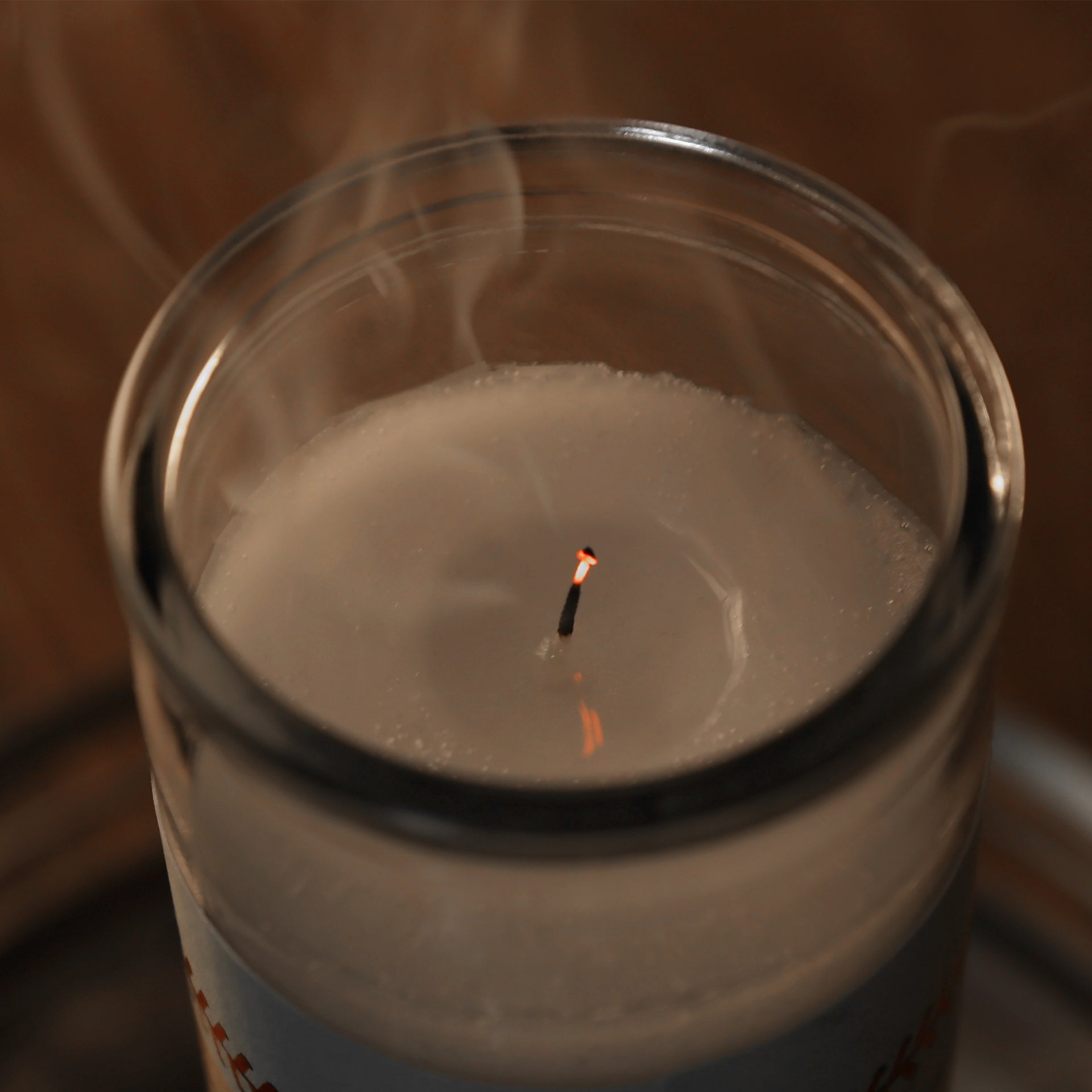 The wick blown out on our Philadelphia Baseball Game Day Juju Unscented Prayer Candle