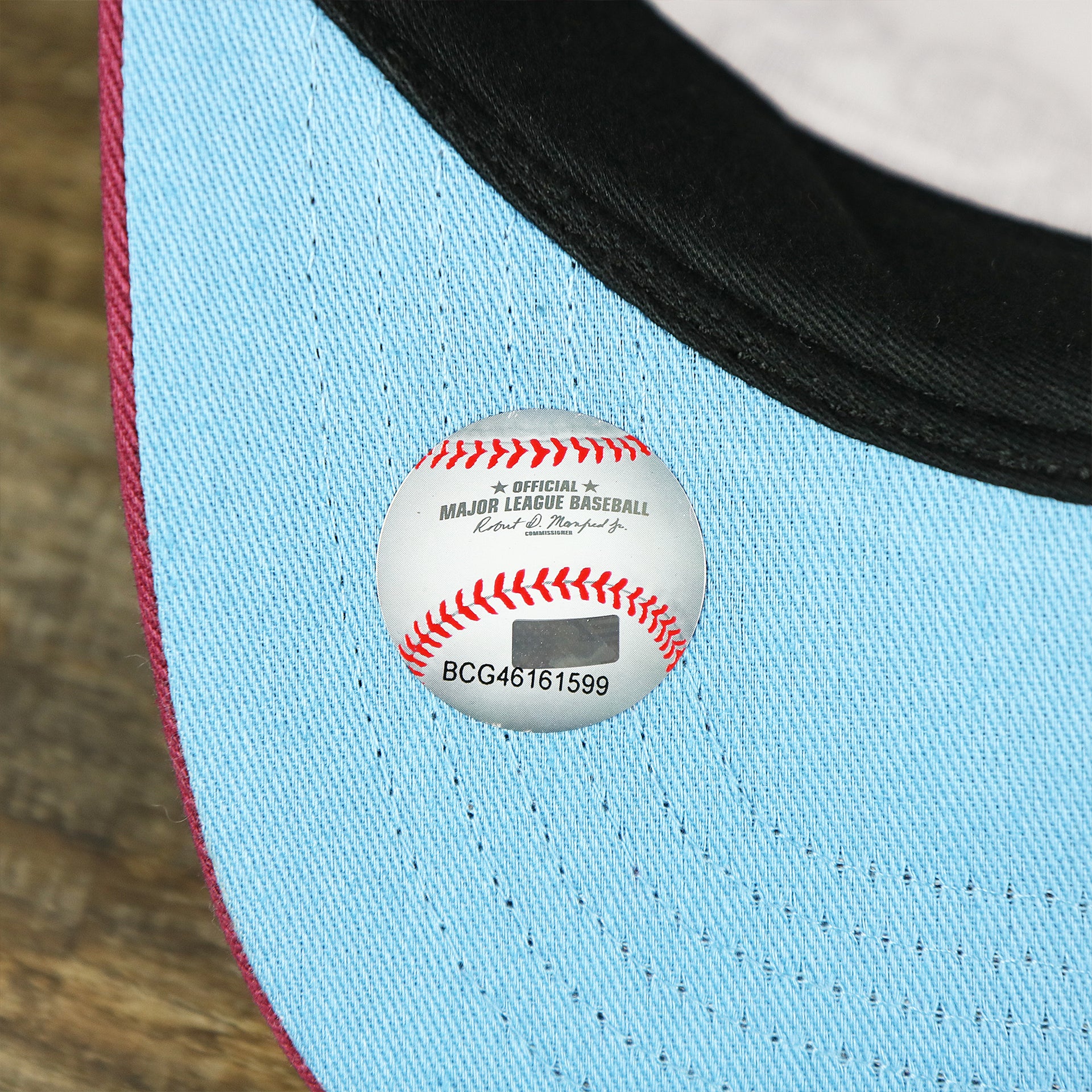 The MLB Baseball Sticker on the Cooperstown Philadelphia Phillies Wordmark Retro Phillies Logo Patch Dad Hat | Cardinal Dad Hat