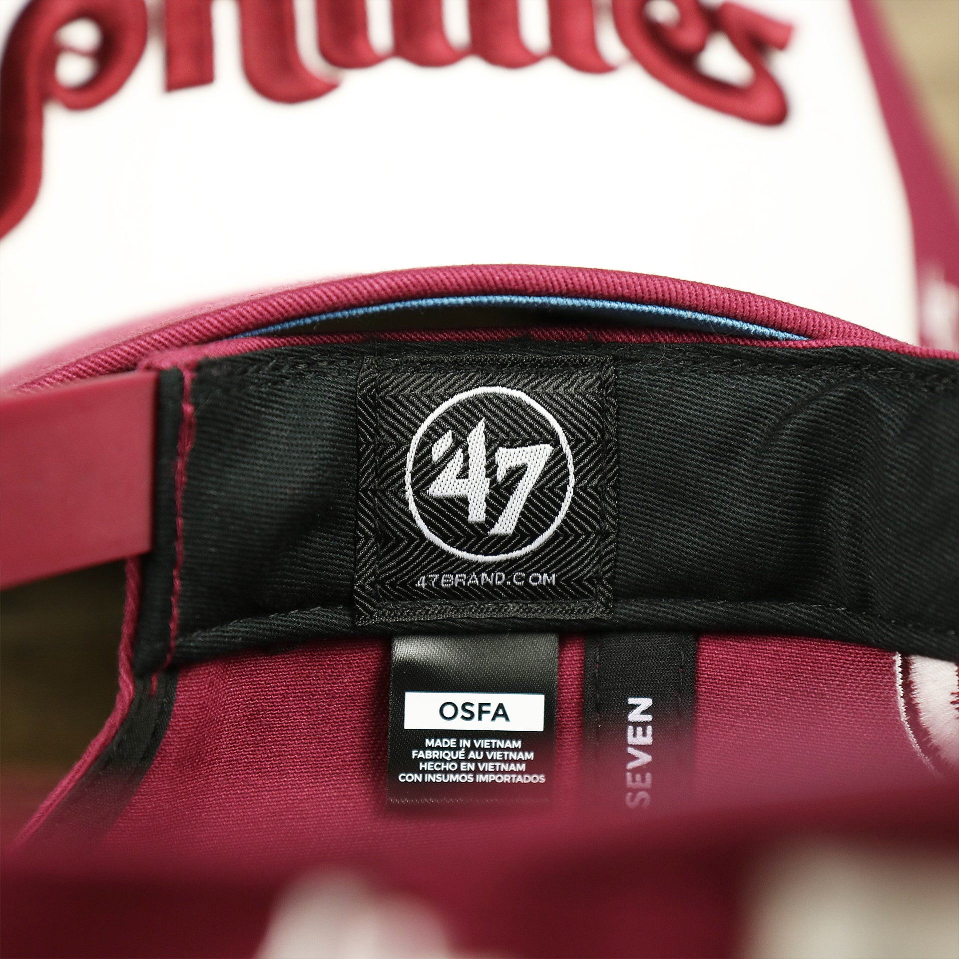 The 47 brand Tag on the Cooperstown Philadelphia Phillies Wordmark Retro Phillies Logo Patch Dad Hat | Cardinal Dad Hat