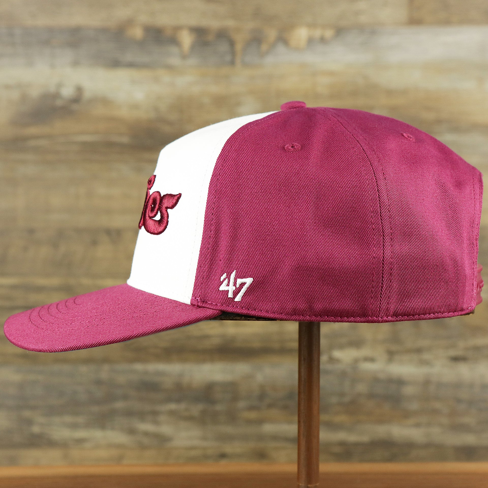 The wearer's left on the Cooperstown Philadelphia Phillies Wordmark Retro Phillies Logo Patch Dad Hat | Cardinal Dad Hat