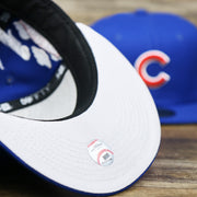 The undervisor on the Chicago Cubs Wrigley Field Side Patch Gray Bottom 59Fifty Fitted Cap | Royal Blue 59Fifty Cap