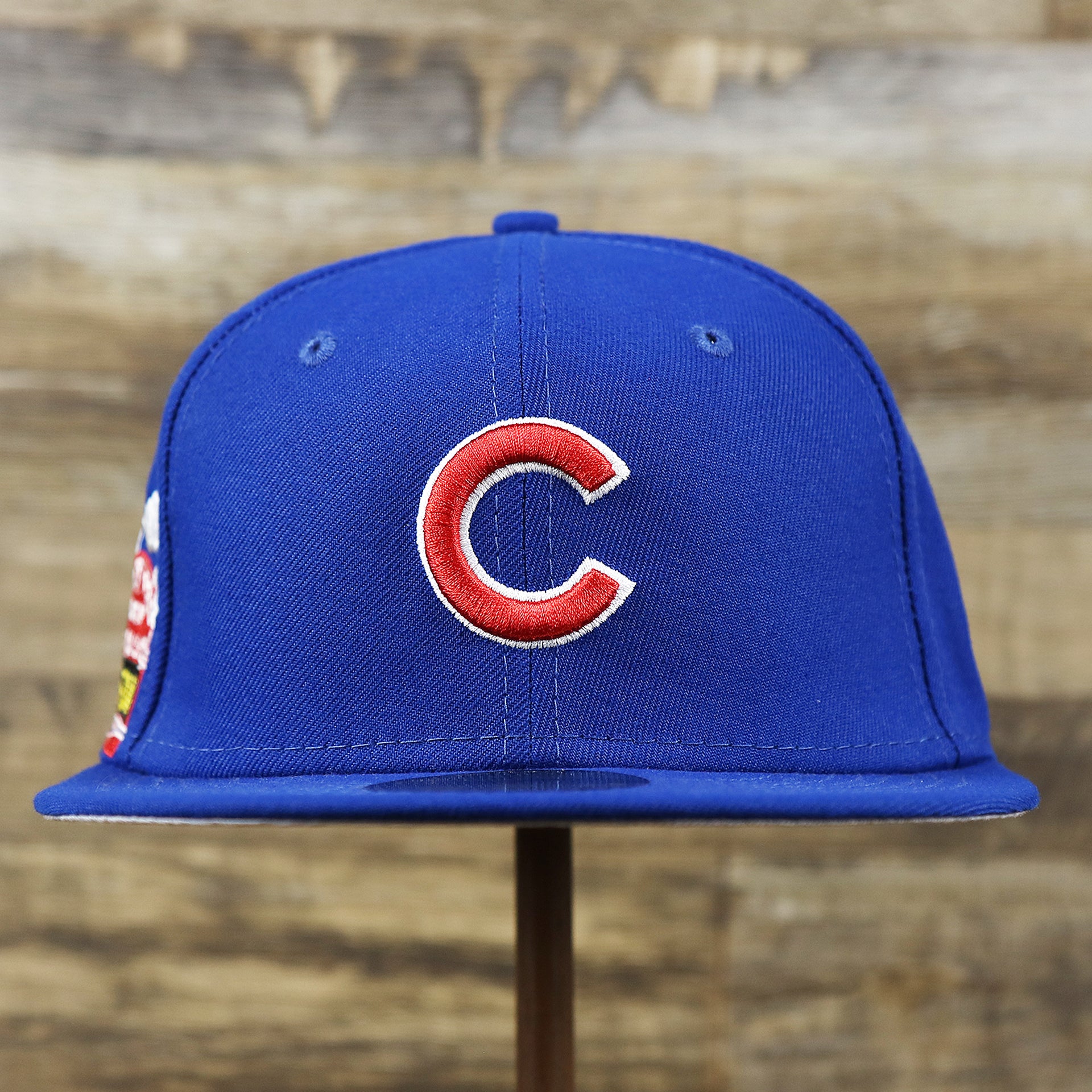 The front of the Chicago Cubs Wrigley Field Side Patch Gray Bottom 59Fifty Fitted Cap | Royal Blue 59Fifty Cap