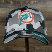 The front of the Throwback Miami Dolphins OnField NFL Summer Training 2022 39Thirty Camo FlexFit Cap | New Era Turquoise