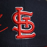 The Cardinals Logo on the Saint Louis Cardinals MLB Side Font Green Bottom 9Fifty Snapback Cap | Black Snap Cap