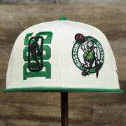 The front of the Boston Celtics NBA 2022 Draft Gray Bottom 9Fifty Snapback | New Era Cream/Kelly Green