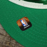 The NBA Offical Headwear Sticker on the Boston Celtics NBA 2022 Draft Gray Bottom 9Fifty Snapback | New Era Cream/Kelly Green