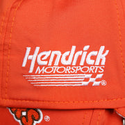 The Hendrick Motorsports logo on the Nascar Chase Elliot Number 9 Hendrick Motorsport Hooters Logo 39Thirty FlexFit Cap | Orange 39Thirty Cap