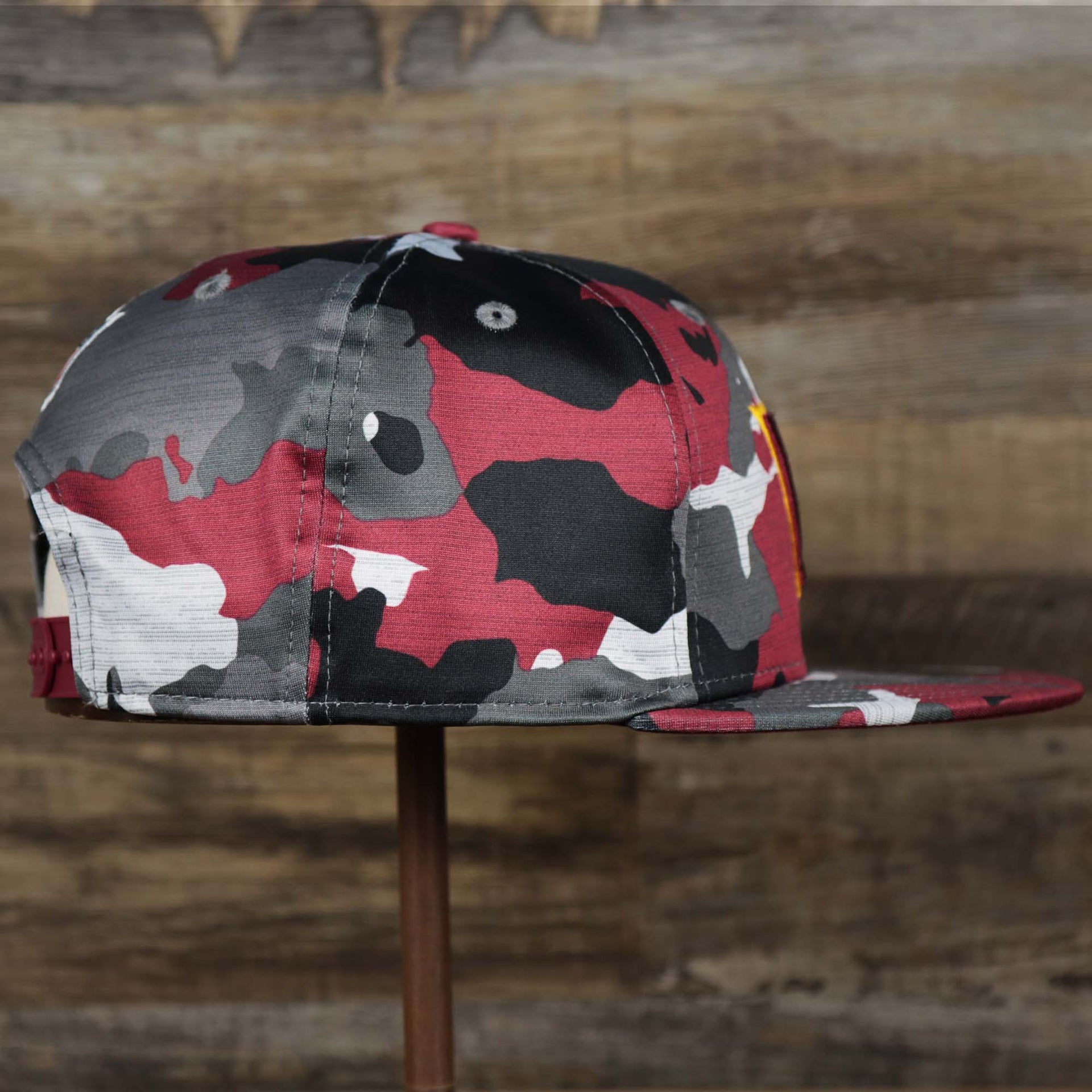 The Wearer's Right on the Washington Commanders NFL OnField Summer Training 2022 Camo 9Fifty Snapback | Burgundy Camo 9Fifty