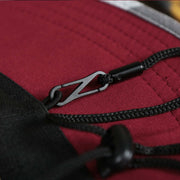 The detachable clasp on the Washington Commanders NFL Summer Training Camp 2022 Camo Bucket Hat | Burgundy Bucket Hat