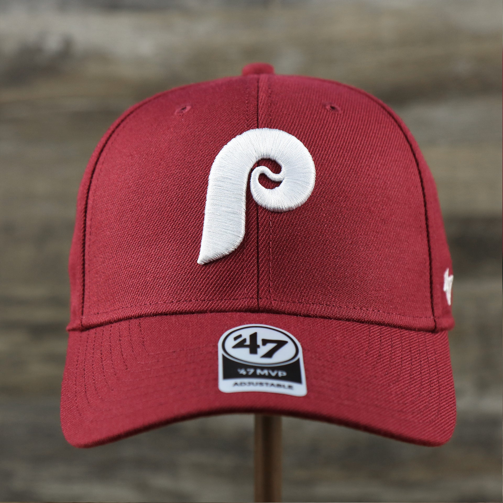 The front of the Cooperstown Philadelphia Phillies Retro Phillies Logo Gray Bottom Dad Hat | Maroon Dad Hat