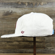 The wearer's left of the Cooperstown Philadelphia Phillies Corduroy Snapback Hat | White Corduroy Snap Cap