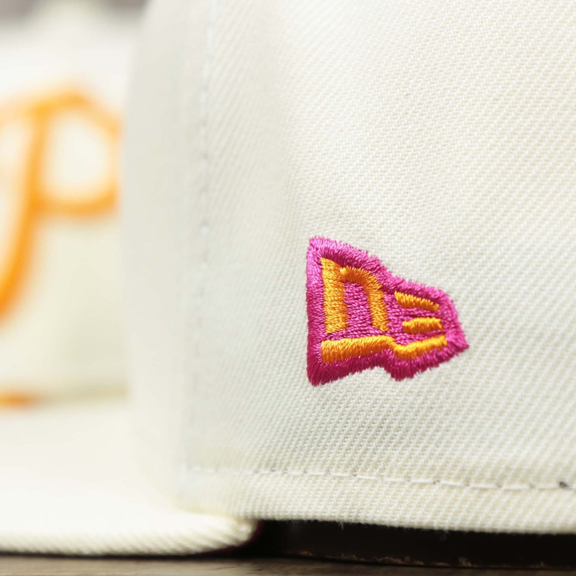 The New Era Logo on the Cooperstown Philadelphia Phillies Coffee Shop 1952 All Star Game Liberty Bell Side Patch 59Fifty Fitted Cap | New Era Off White 59Fifty