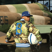 The backside of the liner on the Cooperstown Brooklyn Dodgers MLB Patch Alpha Industries Reversible Bomber Jacket With Camo Liner | Royal Blue Bomber Jacket