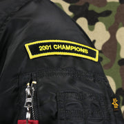 The 2001 Champions Side Patch on the Cooperstown Arizona Diamondbacks MLB Patch Alpha Industries Reversible Bomber Jacket With Camo Liner | Black Bomber Jacket