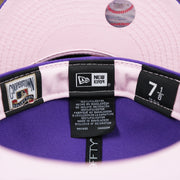 The Tags on the Cooperstown Arizona Diamondbacks Pop Sweat Pastel World Series Side Patch Fitted Cap With Pink Undervisor | Purple 59Fifty Cap