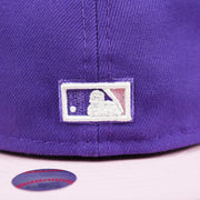 The MLB Batterman Logo on the Cooperstown Arizona Diamondbacks Pop Sweat Pastel World Series Side Patch Fitted Cap With Pink Undervisor | Purple 59Fifty Cap