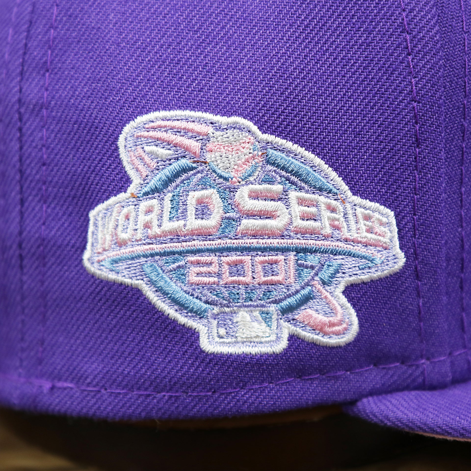 The World Series Pastel Patch on the Cooperstown Arizona Diamondbacks Pop Sweat Pastel World Series Side Patch Fitted Cap With Pink Undervisor | Purple 59Fifty Cap