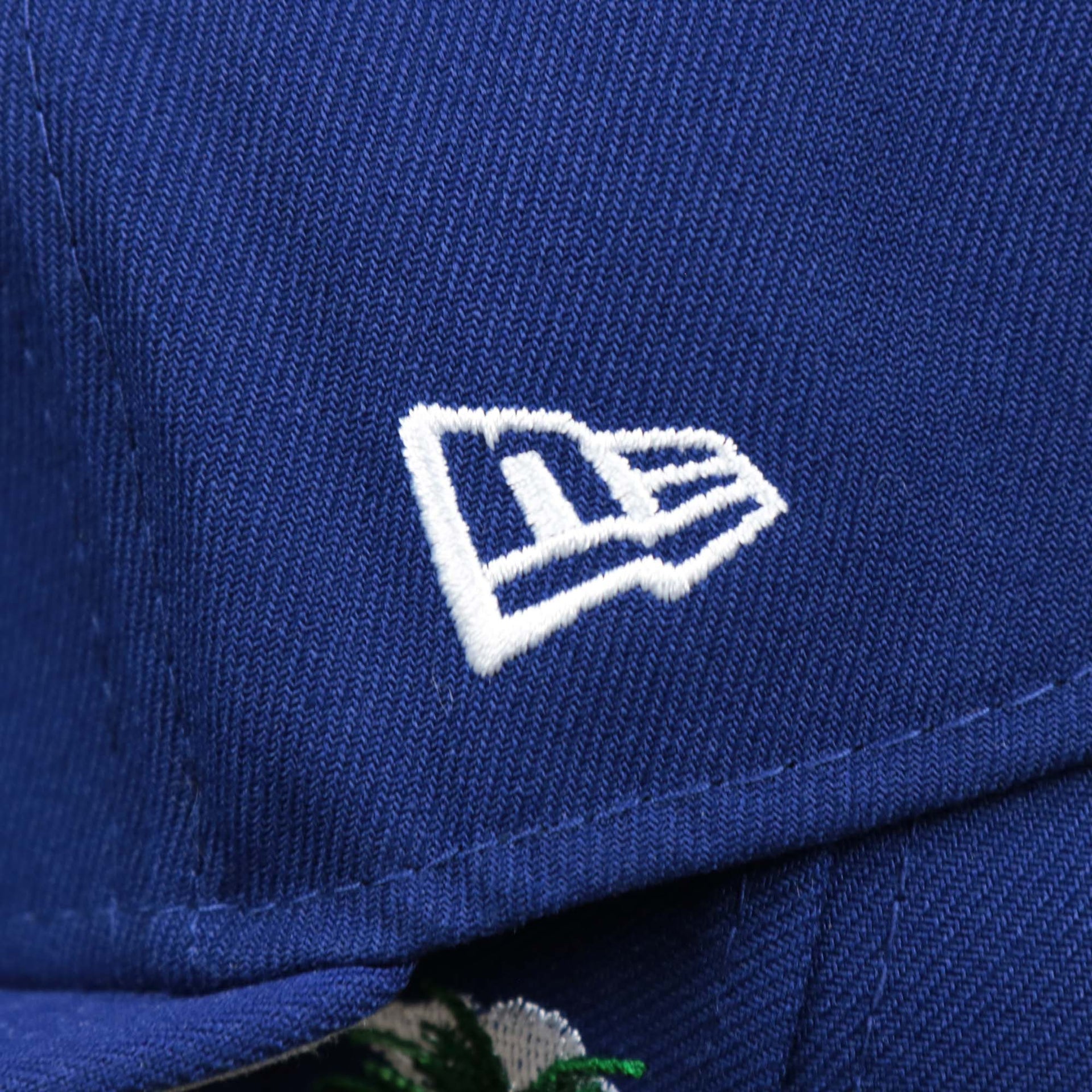 The New Era Logo on the Los Angeles Dodgers Side Patch Fitted Gray Bottom 59Fifty Cap | Royal Blue 59Fifty