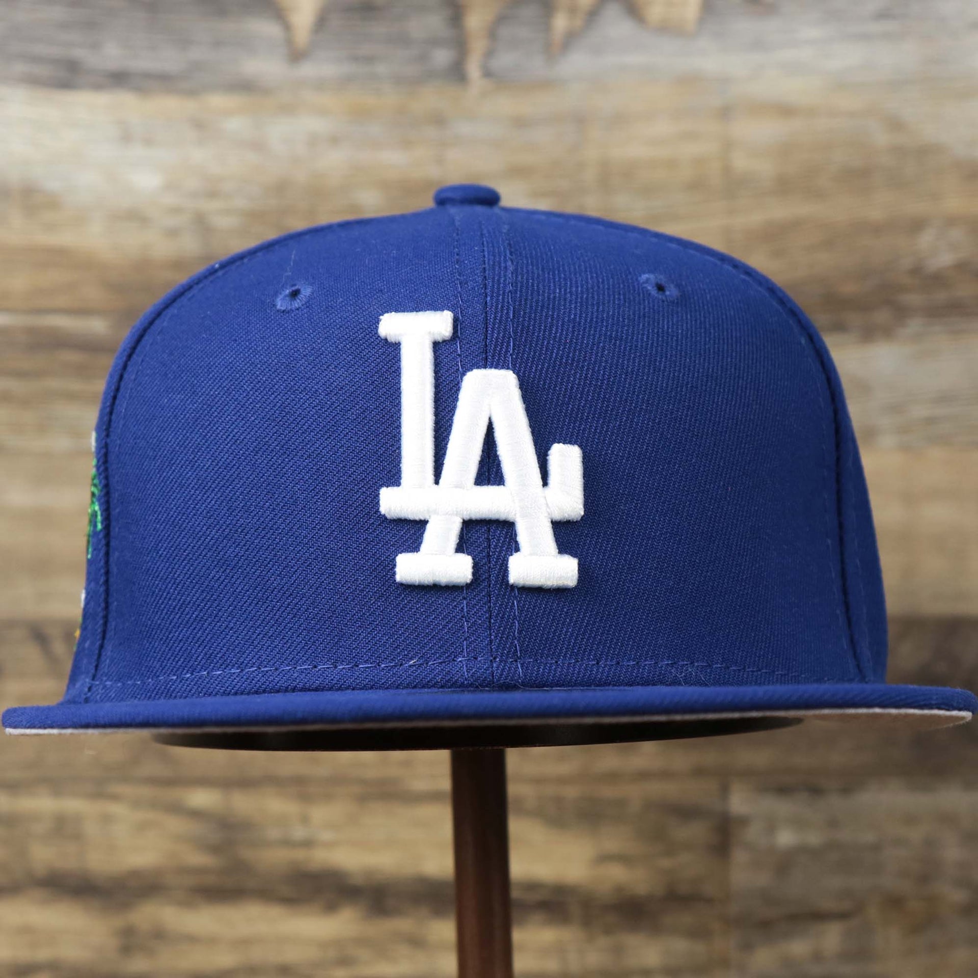 The front of the Los Angeles Dodgers Side Patch Fitted Gray Bottom 59Fifty Cap | Royal Blue 59Fifty