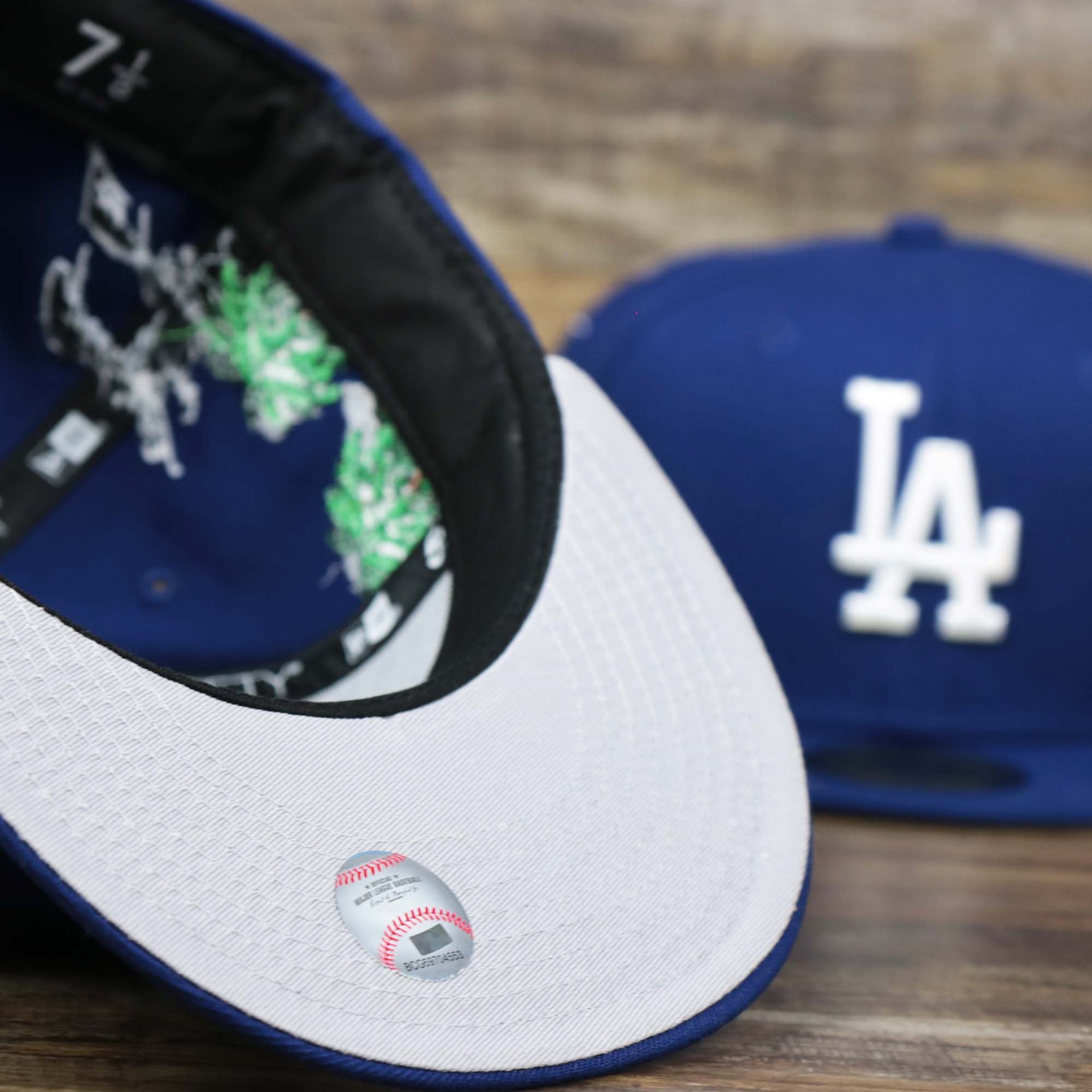 The undervisor on the Los Angeles Dodgers Side Patch Fitted Gray Bottom 59Fifty Cap | Royal Blue 59Fifty