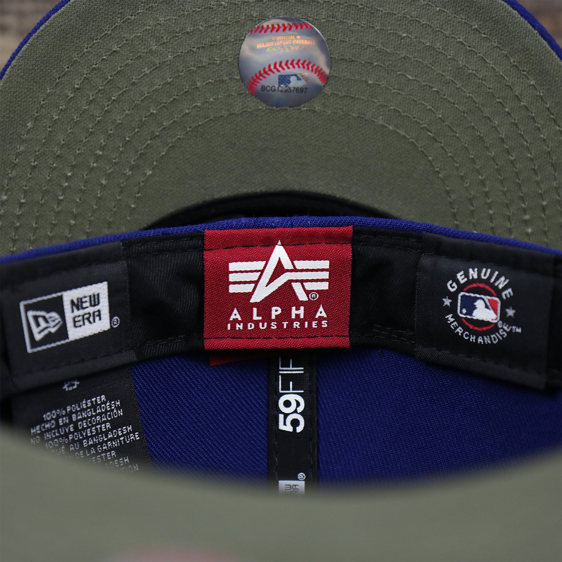 The Tags on the Los Angeles Dodgers Alpha Industries Side Patch Army Green Undervisor 59FIfty Fitted Cap With Hangtag | Royal Blue 59FIfty Cap