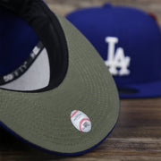 The undervisor on the Los Angeles Dodgers Alpha Industries Side Patch Army Green Undervisor 59FIfty Fitted Cap With Hangtag | Royal Blue 59FIfty Cap