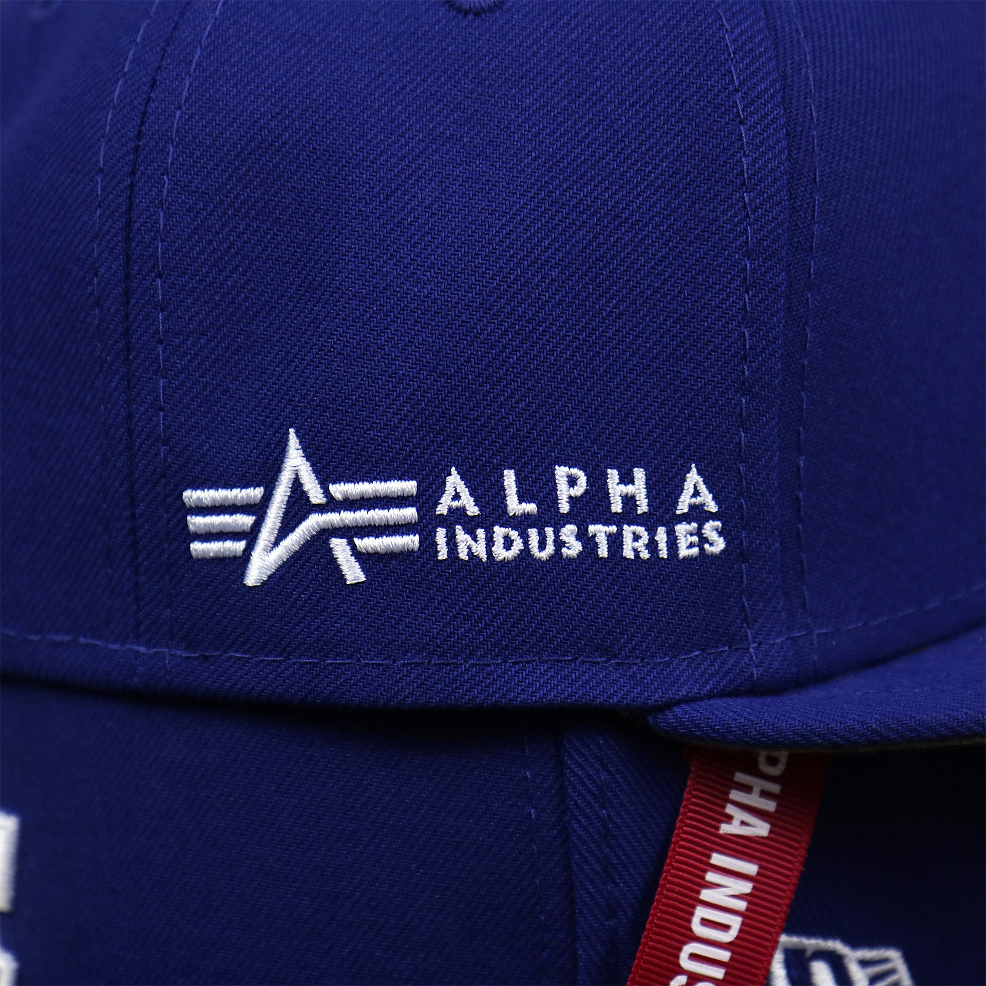 The Alpha Industries Side Patch on the Los Angeles Dodgers Alpha Industries Side Patch Army Green Undervisor 59FIfty Fitted Cap With Hangtag | Royal Blue 59FIfty Cap