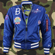 The front of the Cooperstown Brooklyn Dodgers MLB Patch Alpha Industries Reversible Bomber Jacket With Camo Liner | Royal Blue Bomber Jacket