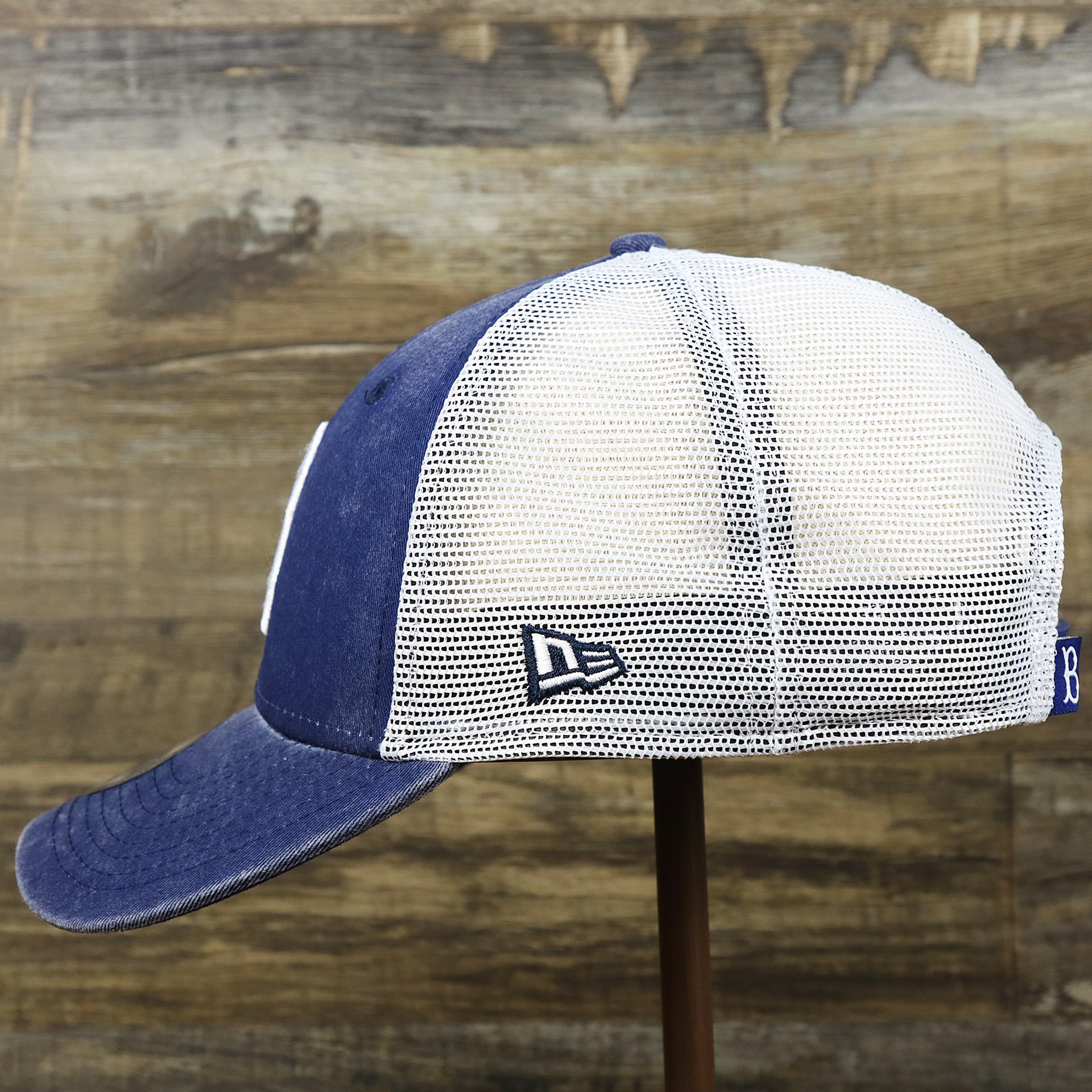 The wearer's left on the Cooperstown Brooklyn Dodgers 1947s Logo Worn Colorway Mesh Back 9Forty Dad Hat | Royal Blue 9Forty Hat